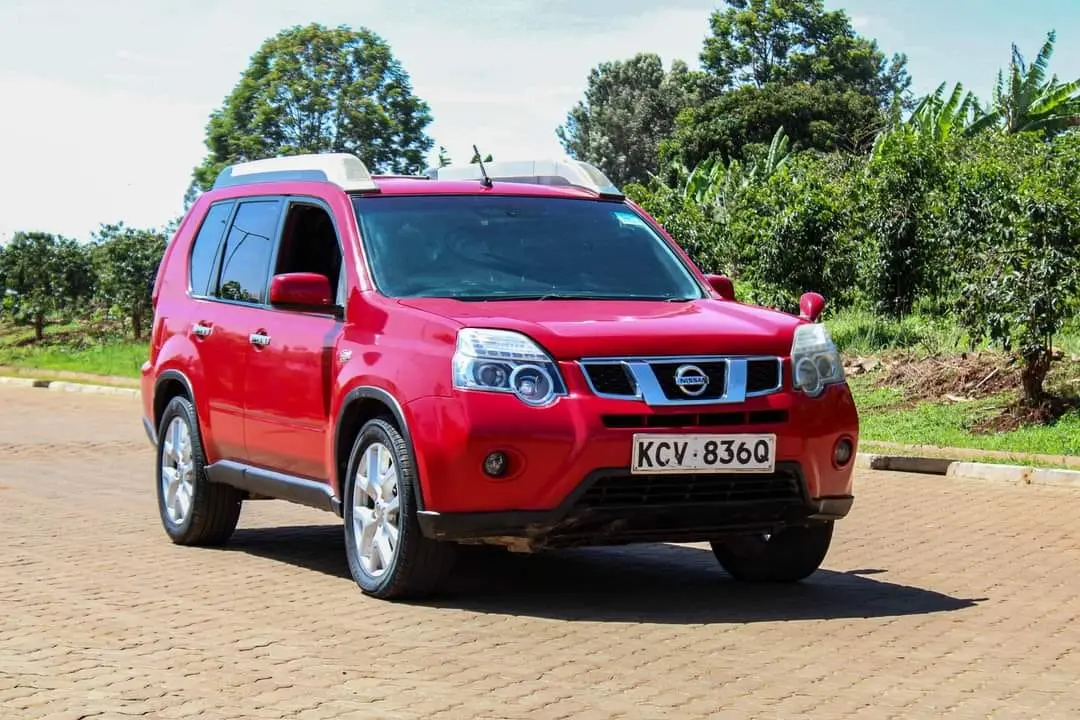Red Nissan X-Trail photographed from the front