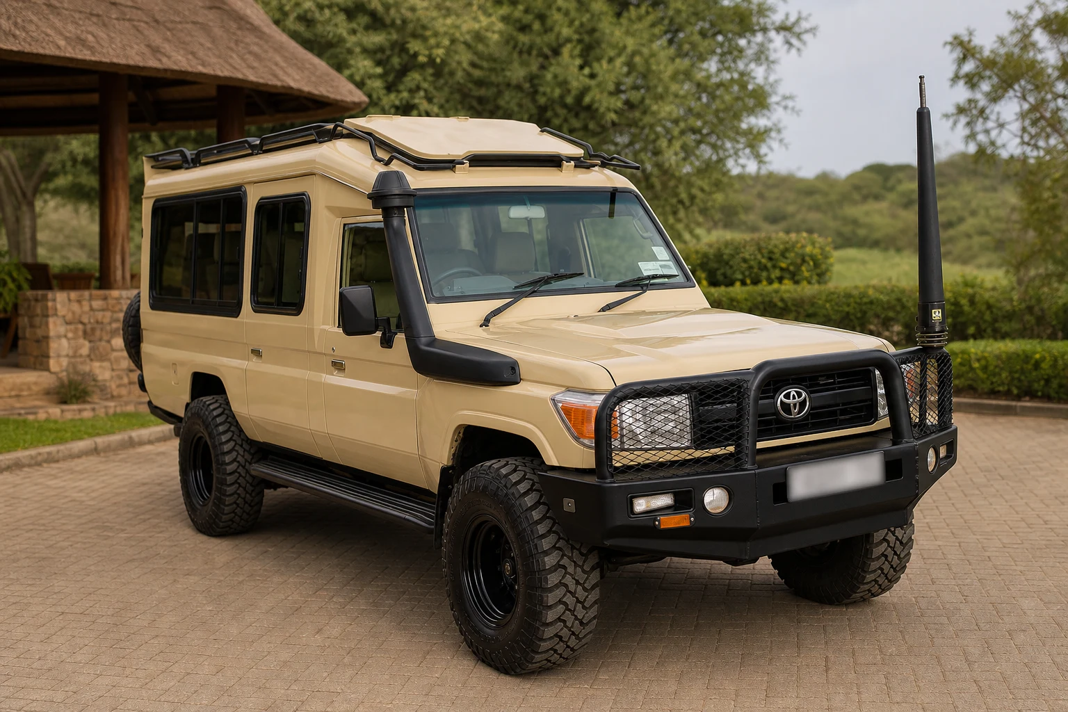Beige Toyota safari Land Cruiser 4x4 with viewing roof, snorkel and bull bar